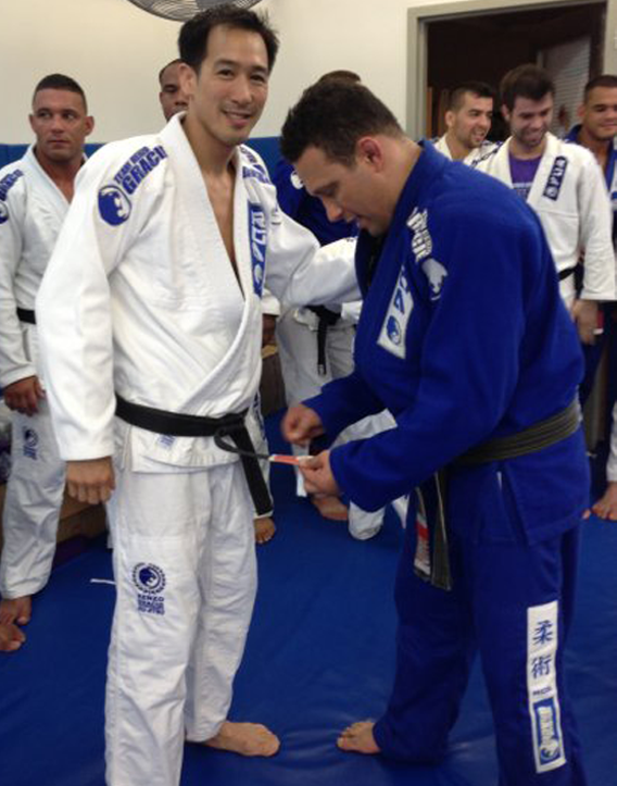 Alan_Teo_Receiving_2nd_Degree_Belt_from_Master_Renzo_Gracie